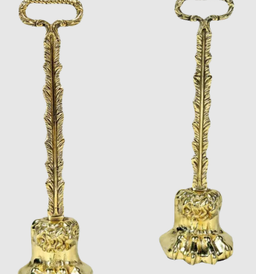 PAIR OF 19TH CENTURY WEIGHTED HAIRY PAW BRASS DOOR PORTERS